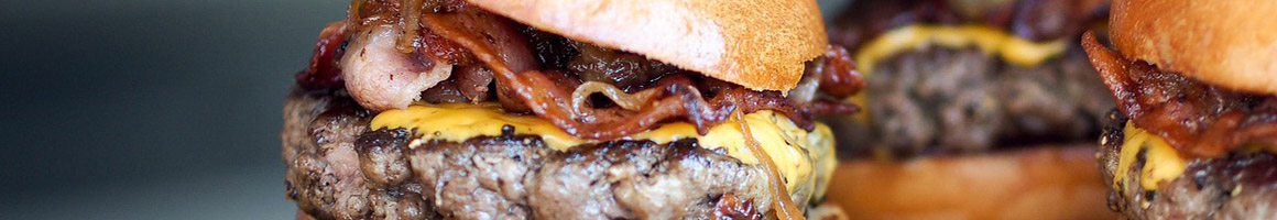 Eating Burger Hot Dog at CJ's Butcher Boy Burgers restaurant in Russellville, AR.